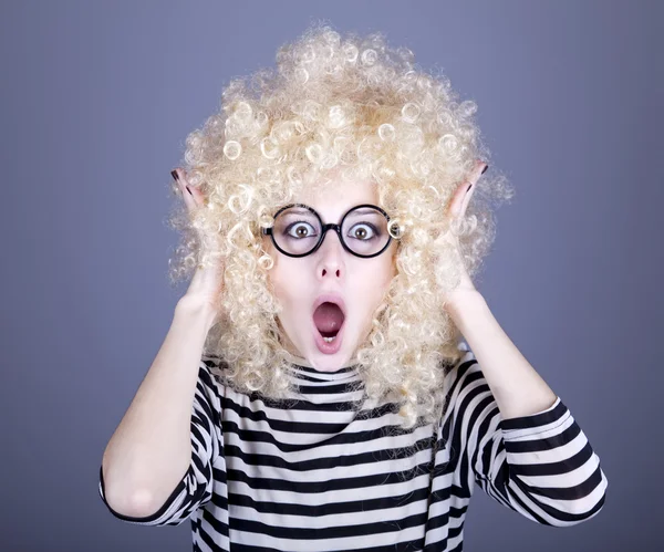 stock image Portrait of feared girl in blonde wig.