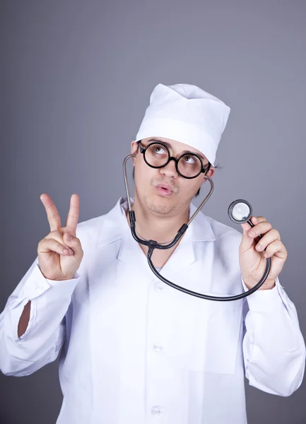 Crazy doctor with a stethoscope. — Stock Photo, Image