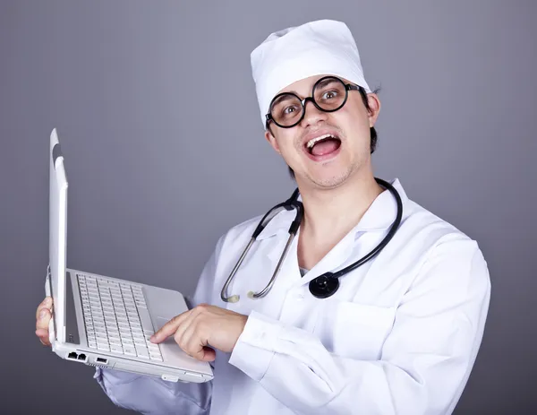 Shouting doctor with notebook. — Stock Photo, Image