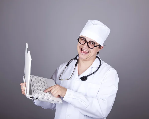 Shouting doctor with notebook. — Stock Photo, Image