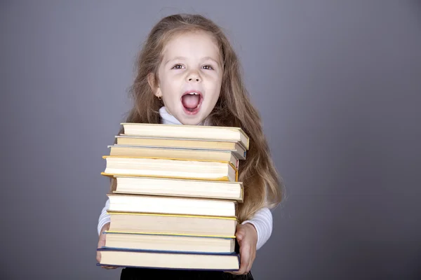 Weinig schoolmeisje witn boeken. — Stockfoto