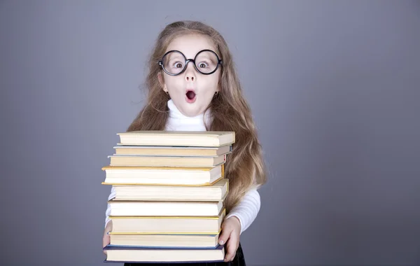Weinig schoolmeisje witn boeken. — Stockfoto