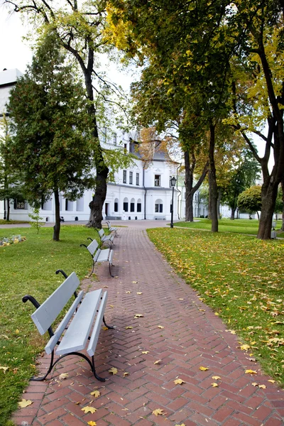 stock image Bench in autumn park.