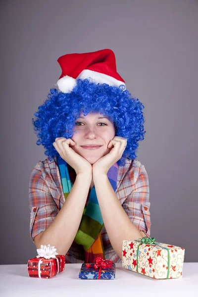 Funny girl with christmas gift. — Stock Photo, Image