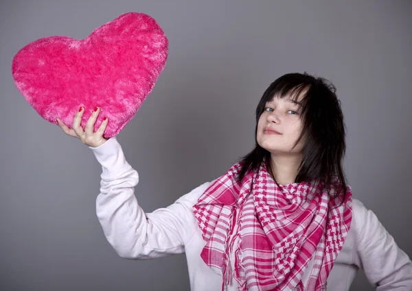 Funny girl with toy heart. — Stock Photo, Image