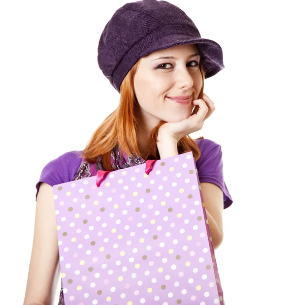Shopping girl in viola con borsa — Foto Stock