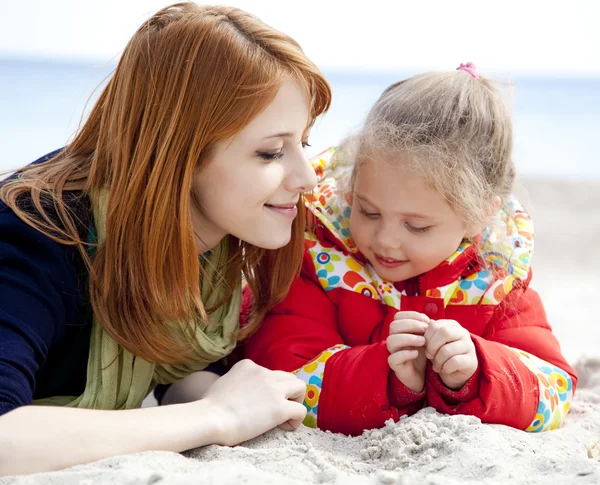 Two sisters at the beach in spring day. — Stock Photo, Image