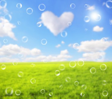 Abstract bubles over green wheat field and clouds heart over it. clipart