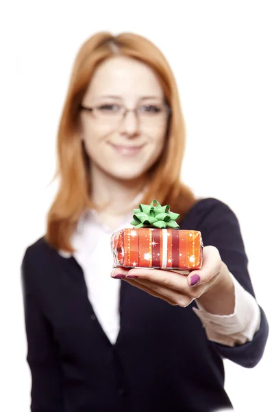 Business women with gift. — Stock Photo, Image
