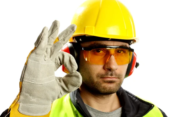 Worker checking vertical level — Stock Photo, Image