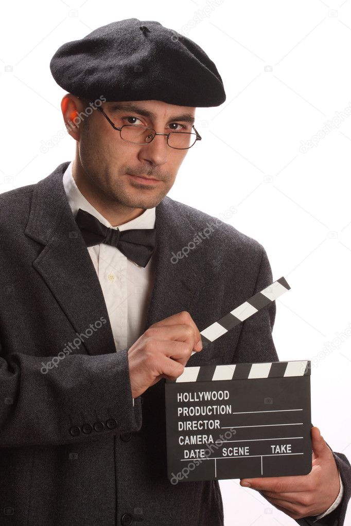 Old fashioned man holding movie clapboard