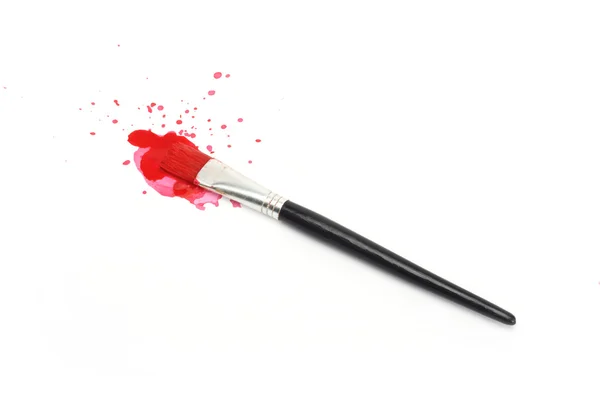Tinta vermelha e escova — Fotografia de Stock