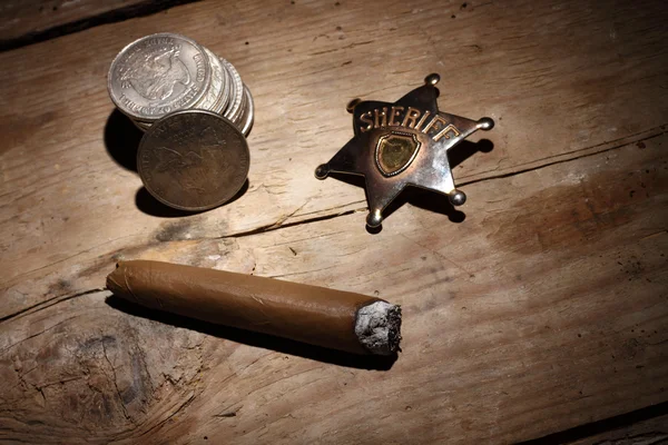 Cigar, badge and coins — Stock Photo, Image