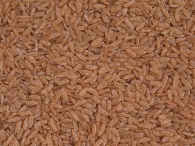 Brown, long grain rice. clipart