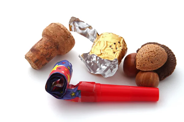 Champagne cork, foil, blower and nuts — Stock Photo, Image