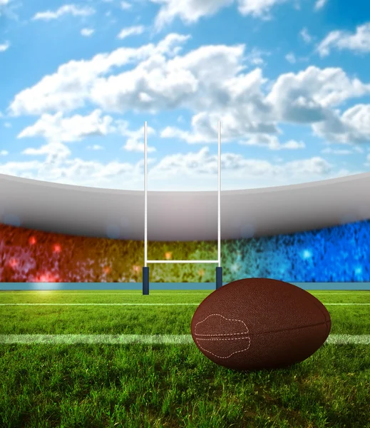 Rugby Ball Auf Dem Feld Mit Stadion Hintergrund — Stockfoto