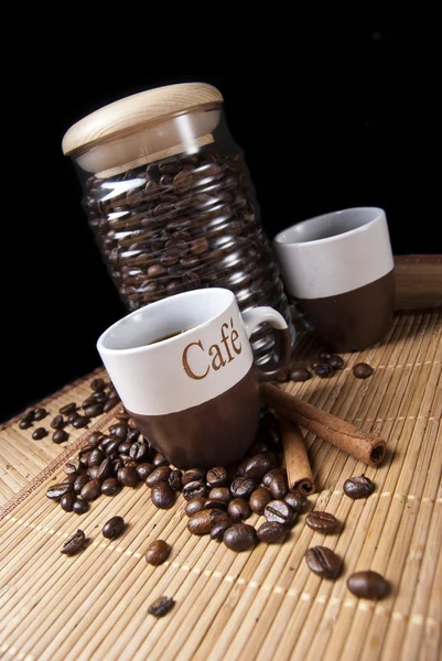 Kávécsésze és kávébab — Stock Fotó