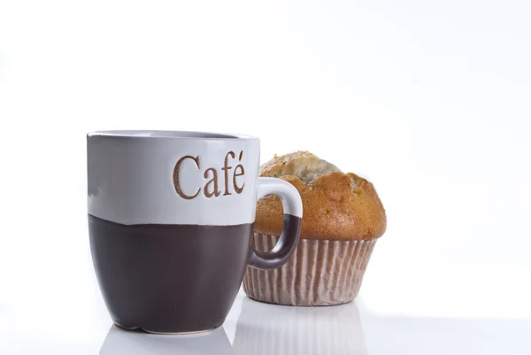 Tazza di caffè e muffin Immagine Stock
