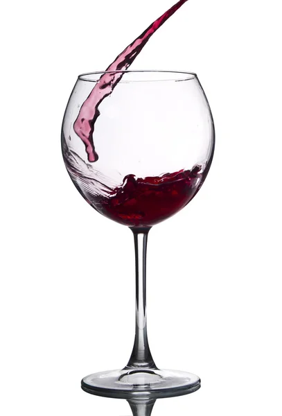 Rode wijn inschenken Stockafbeelding