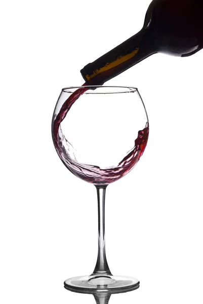 Розливу червоне вино Ліцензійні Стокові Фото