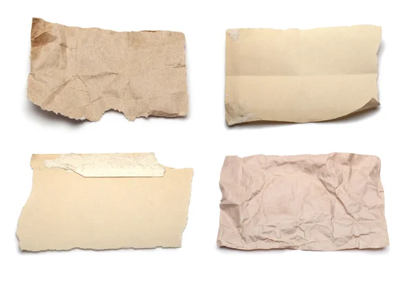 Zerrissene Zettel auf weißem Papier — Stockfoto