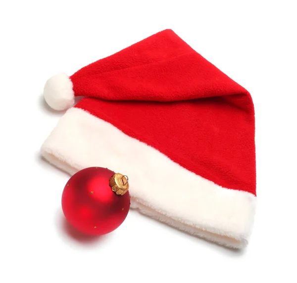 赤いサンタ クロースの帽子とクリスマス ボール — ストック写真