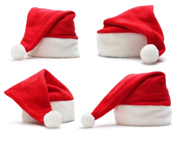 Червоний Санта Клауса капелюх на білому тлі — стокове фото