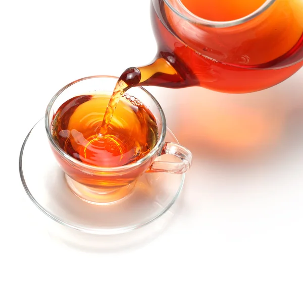 Xícara de chá e bule — Fotografia de Stock
