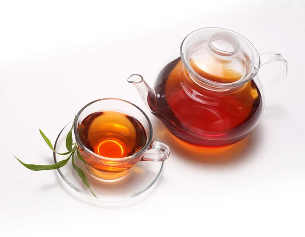 Šálek čaje a čajové konvice — Stock fotografie