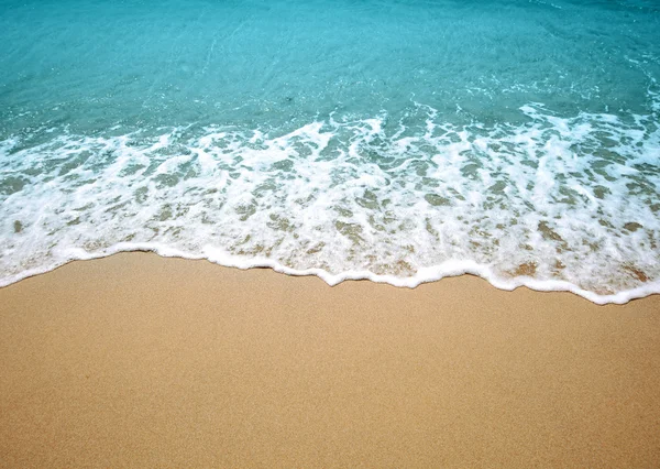 Хвиля і пісок — стокове фото