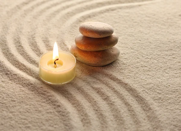 Candle and stone — Stock Photo, Image