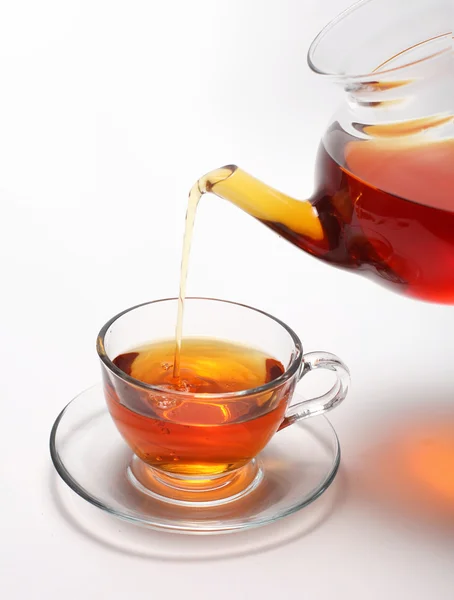 Xícara de chá e bule — Fotografia de Stock