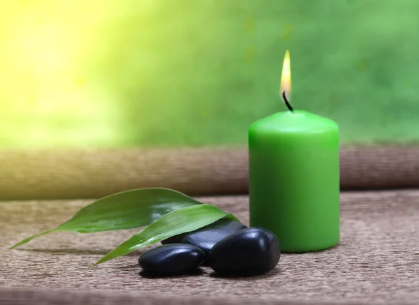 Candle and stone — Stock Photo, Image