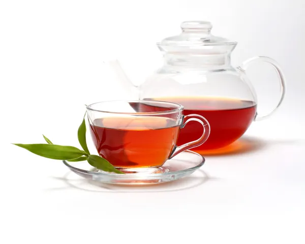 Cup of tea and teapot Stock Picture