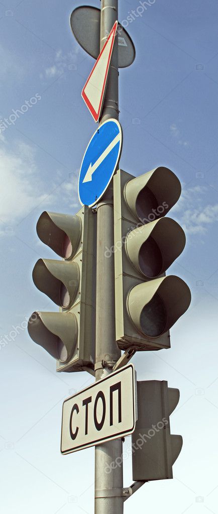 Traffic light and traffic signs at the Moscow crossroads
