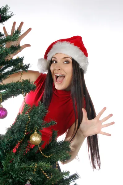 Menina engraçada perto da árvore de Natal — Fotografia de Stock