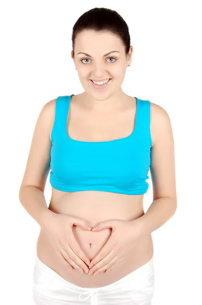 年轻的孕妇抱着肚子 — 图库照片
