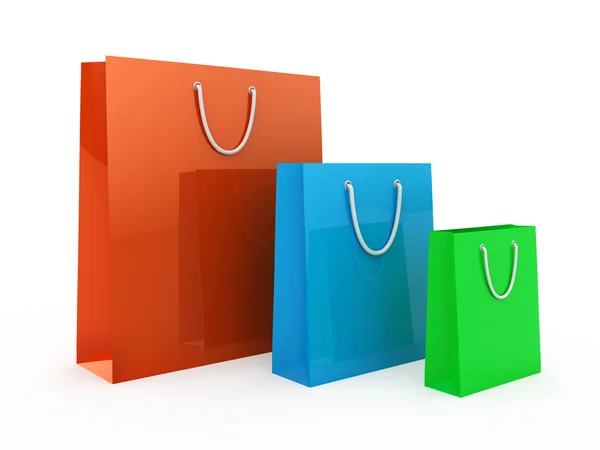 Bolsas de compras coloridas aisladas en blanco — Foto de Stock
