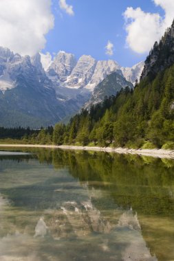 Mountain lake in Italian Alps clipart