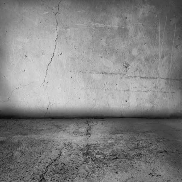 Simple textured grunge interior of a blank wall and floor