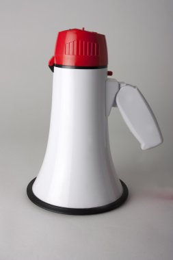 Megaphone shot on grey background clipart