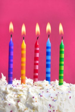 Birthday candles on a cake clipart
