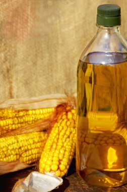 Yellow corn and oil. clipart