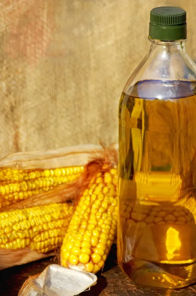 Yellow corn and oil. — Stock Photo, Image
