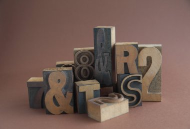 Wood type with ampersands clipart