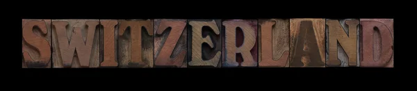 Word Switzerland Old Letterpress Wood Type — Stock Photo, Image