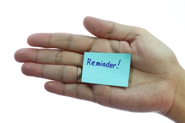 Holding blank notepaper with reminder — Stock Photo, Image