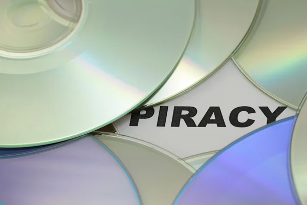DVD i słowo piractwa — Zdjęcie stockowe