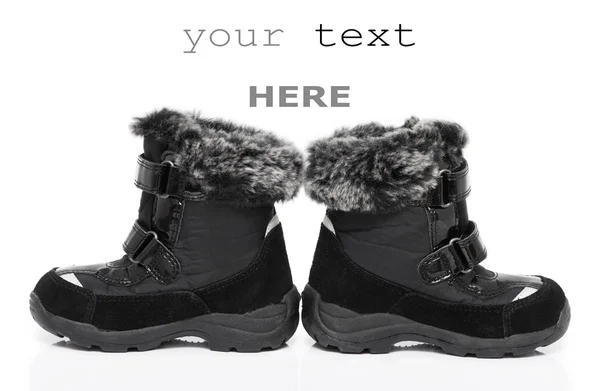 Černé dětské zimní boty — Stock fotografie