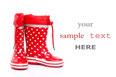 Red rubber boots for kids isolated on white background (with space for text) clipart